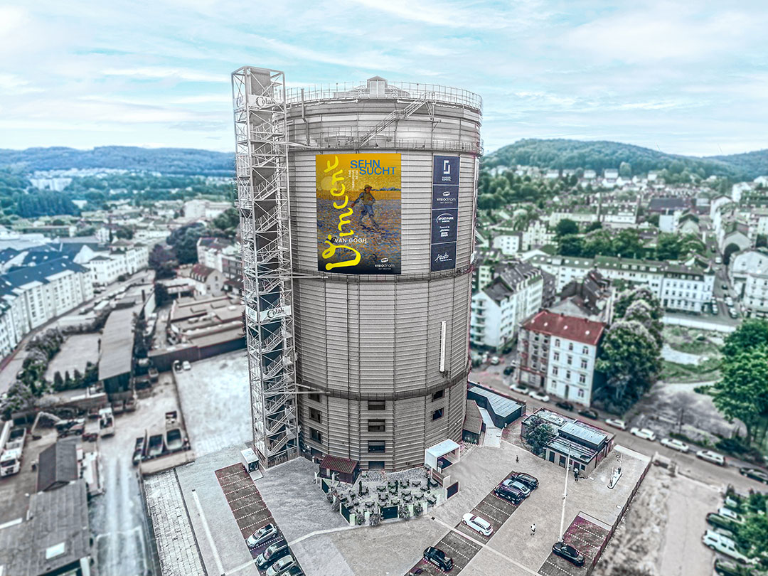 Gaskessel with a large poster of the Van Gogh show on the facade